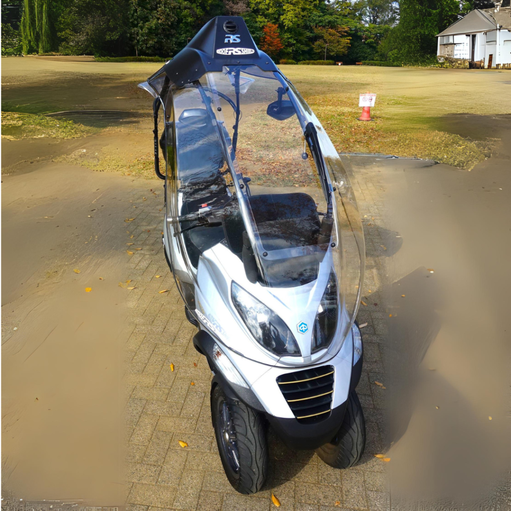 Dakschild met Piaggio MP3