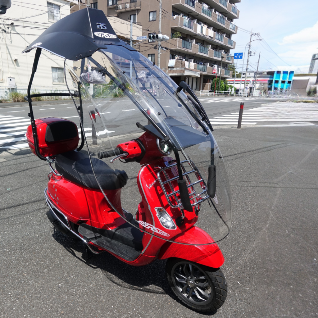 Dakschild met Piaggio Vespa